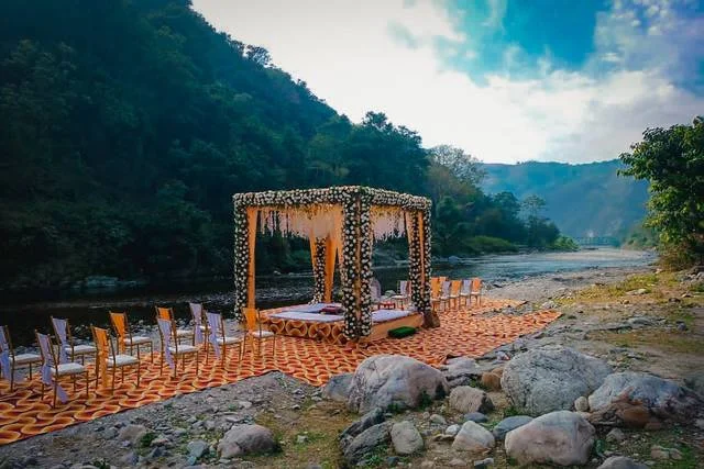 destination wedding setup by the river in Rishikesh